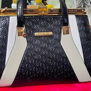 A beautiful Nicole Lee travel bag